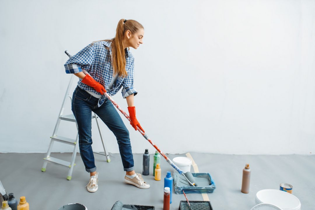 female-house-painter-with-paint-roller.jpg
