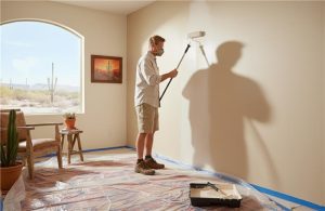 Residential painting services team preparing walls in Arizona home