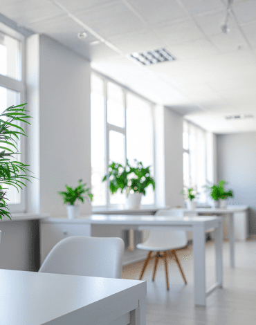 Professional painters preparing walls for commercial painting